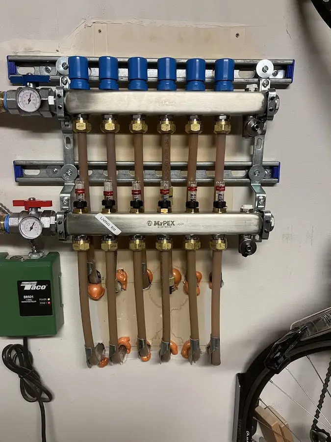 Plumber performing Leak Detection at a residential property in Washington Terrace